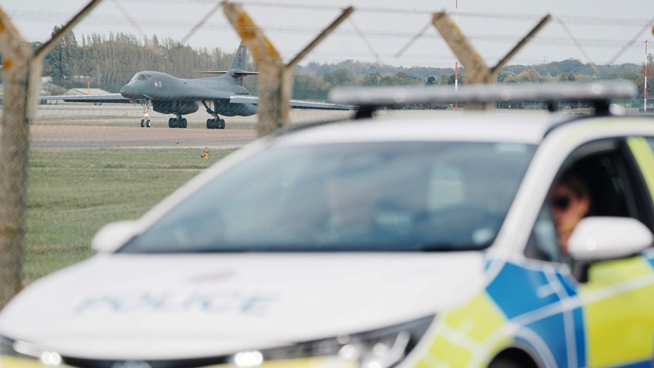 AI-generated conceptual illustration for Two Men Charged in Britain Over Alleged Assistance to Iranian Intelligence at RAF Fairford Base